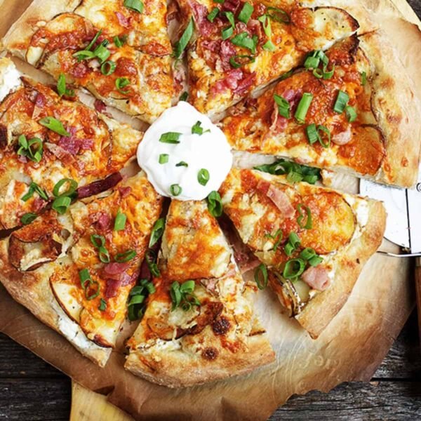 PEROGY PIZZA WITH CRISPY BACON AND SAUTEED ONIONS